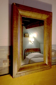 Room 32, reflection of twin bed in mirror, perpindicular to queen bed, private bath/A/C
