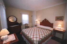 Wellfleet MA lodging Queen Bed, corner room, first floor, view of pond, Room 17